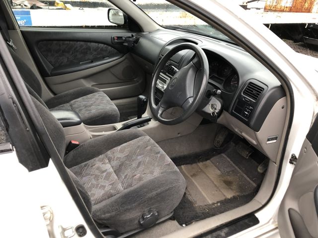 inside of car ST210 - 1998 Toyota CALDINA  - WHITE